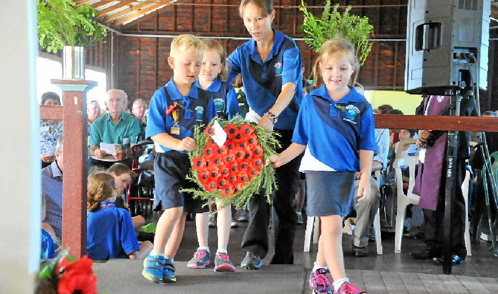 Noah Pengelly and Vanessa Manley, carry the wreath for Builyan State School at the Ubobo Anzac Day ceremony. Noah Pengelly and Vanessa Manley, carry the wreath for Builyan State School at the Ubobo Anzac Day ceremony.